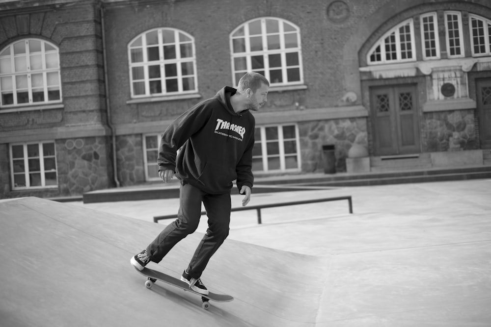 grayscale photo of a man skateboarding photo – Free Aarhus Image on Unsplash