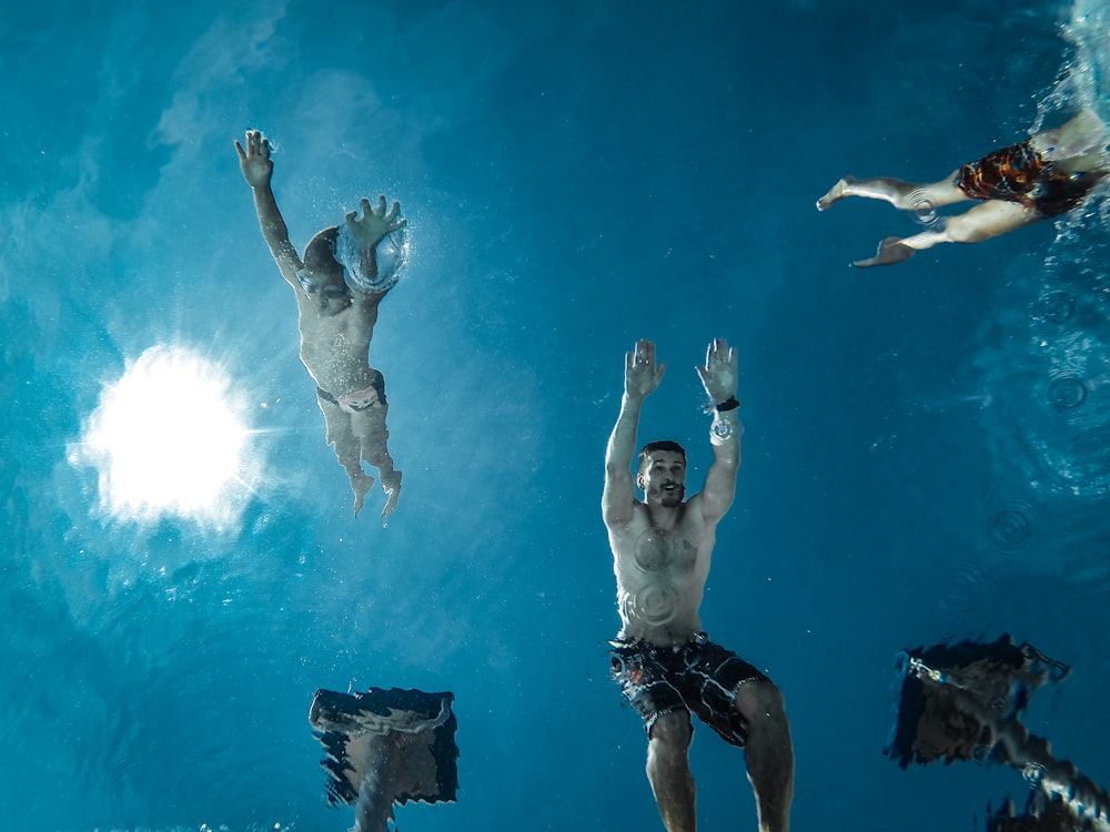 painting of man on under water