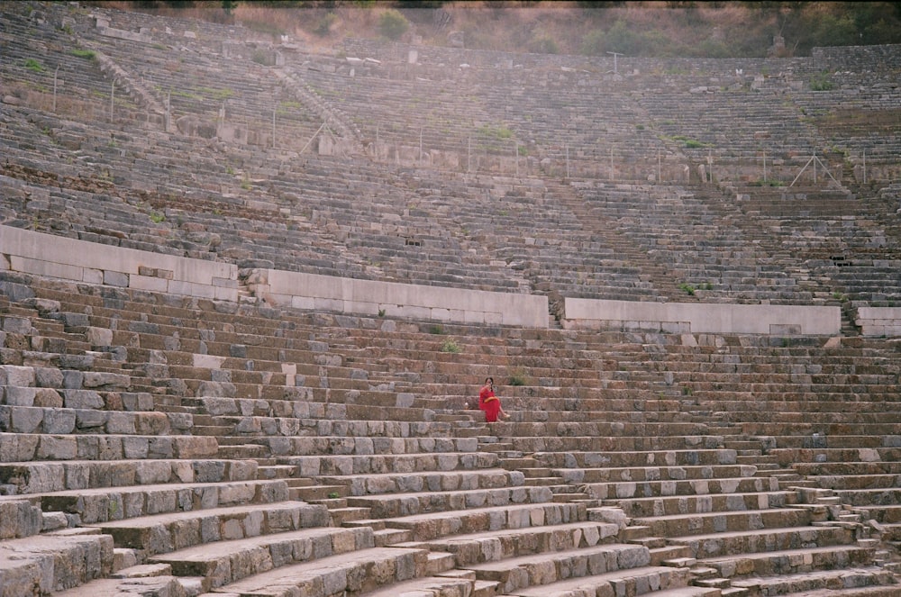 woman sitting on grand stand