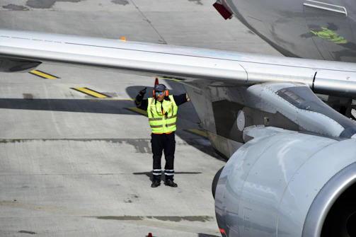 man wearing green reflector suit
