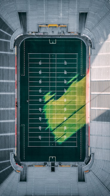 aerial photo of football field during daytime