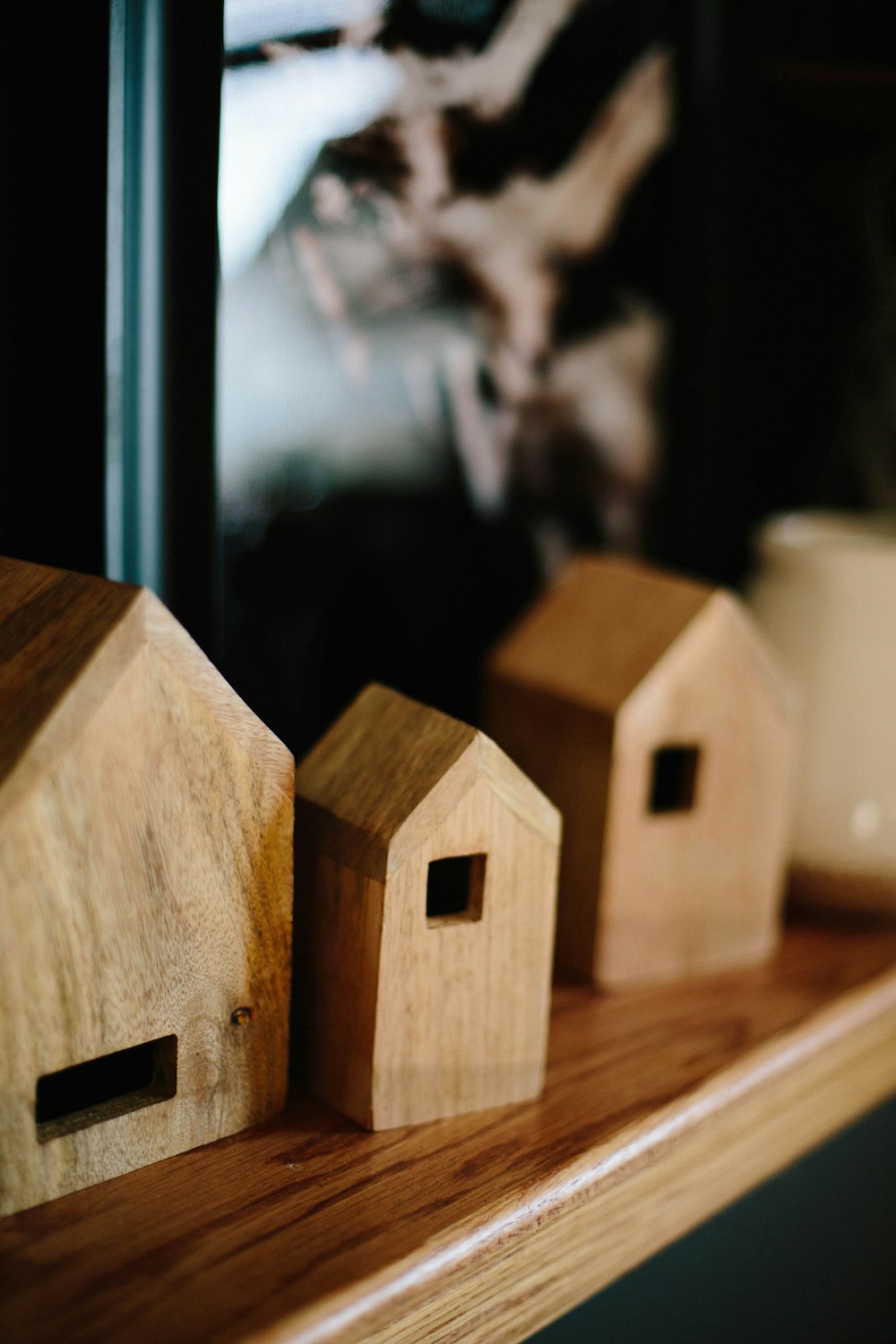 shallow focus photo of brown wooden house miniature