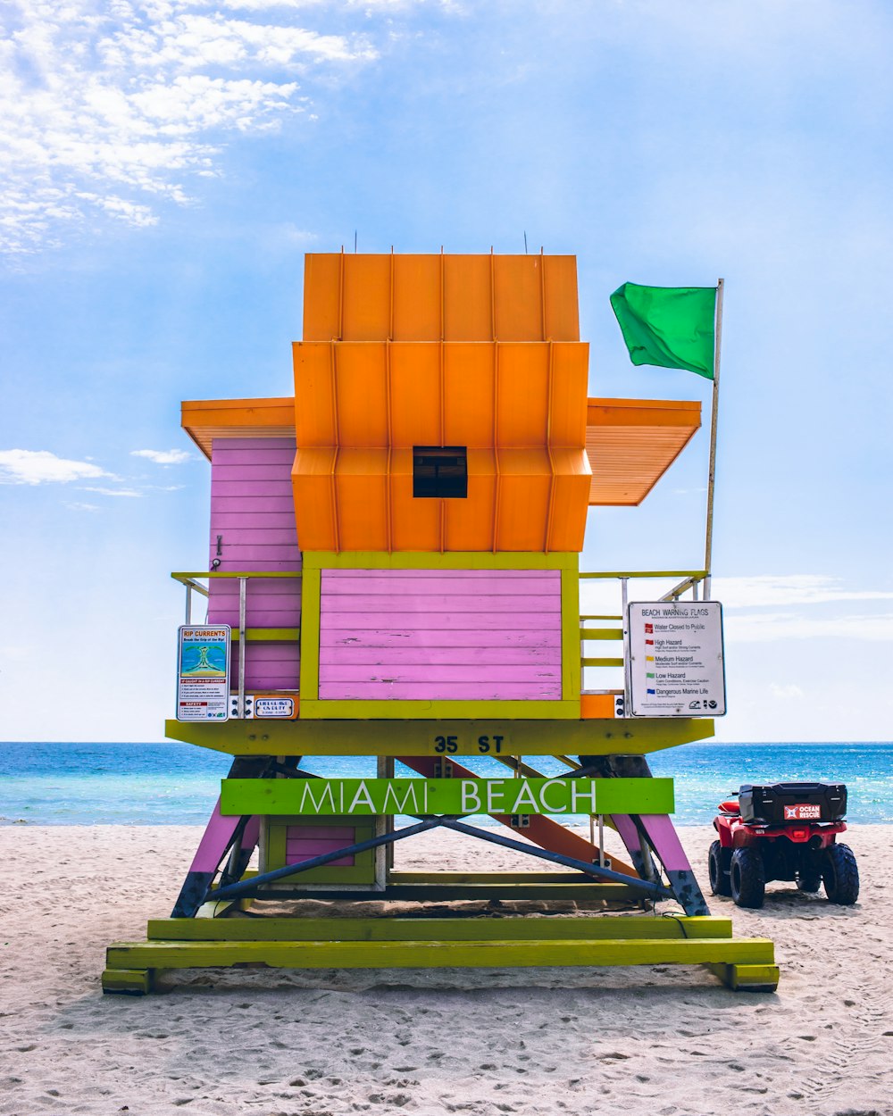 orange and pink life guard house