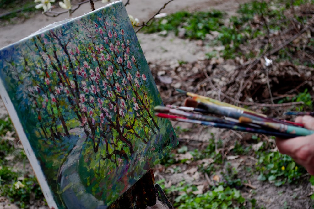 green and pink trees and flower painting