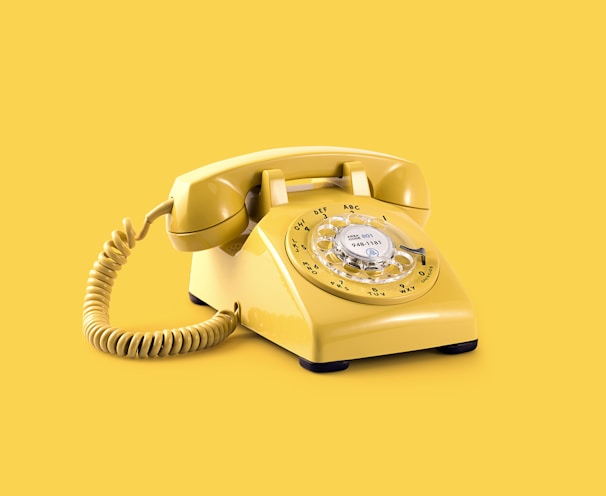 yellow rotary telephone