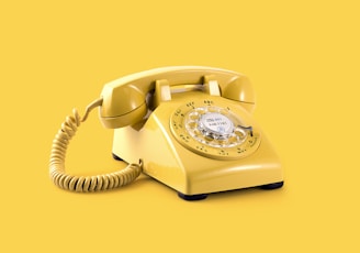 yellow rotary telephone