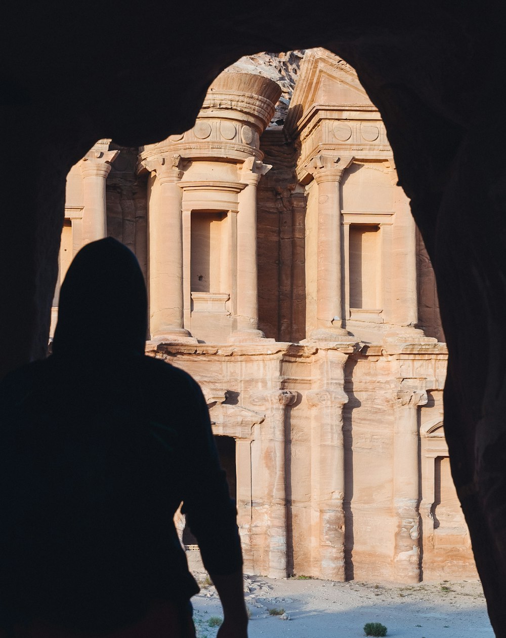 a person standing in front of a building