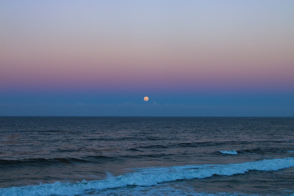 calm sea under full moon view