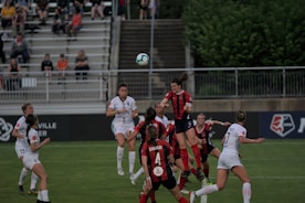 Mixed-gender team enjoying a casual open play match