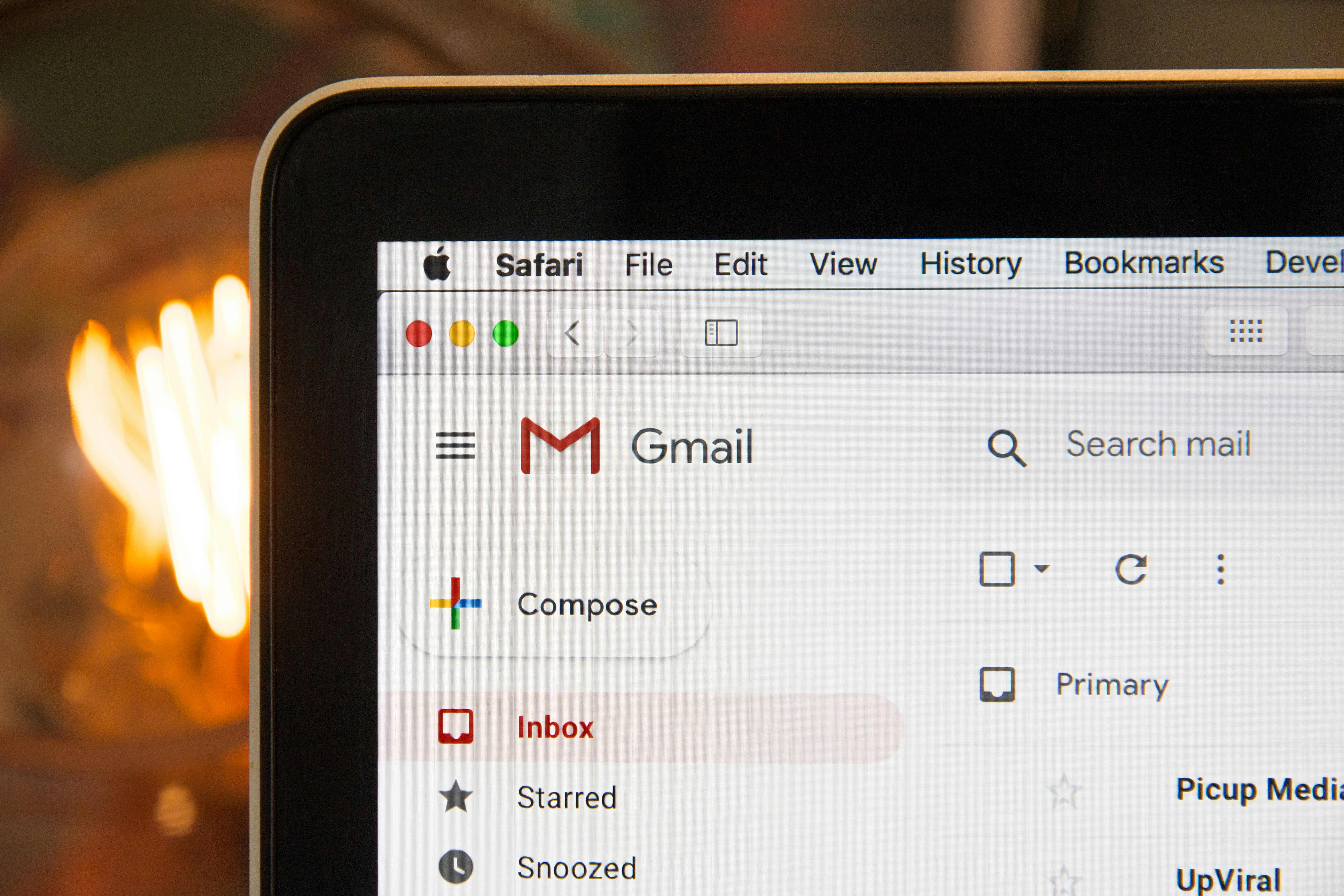 A laptop screen showing gmail inbox - Hotcopy
