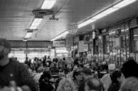 A bustling restaurant interior filled with happy diners.