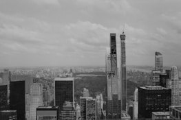 Grayscale image of a city skyline at dusk, symbolizing growth and opportunity.