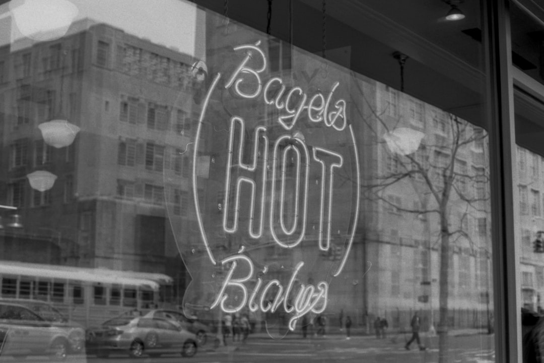 grayscale photography of Bagels Hot Baialys store