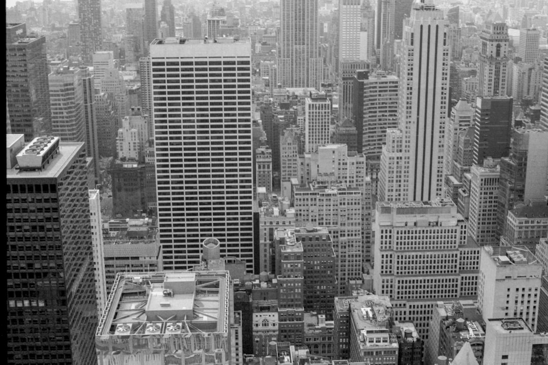 grayscale photo of city buildings