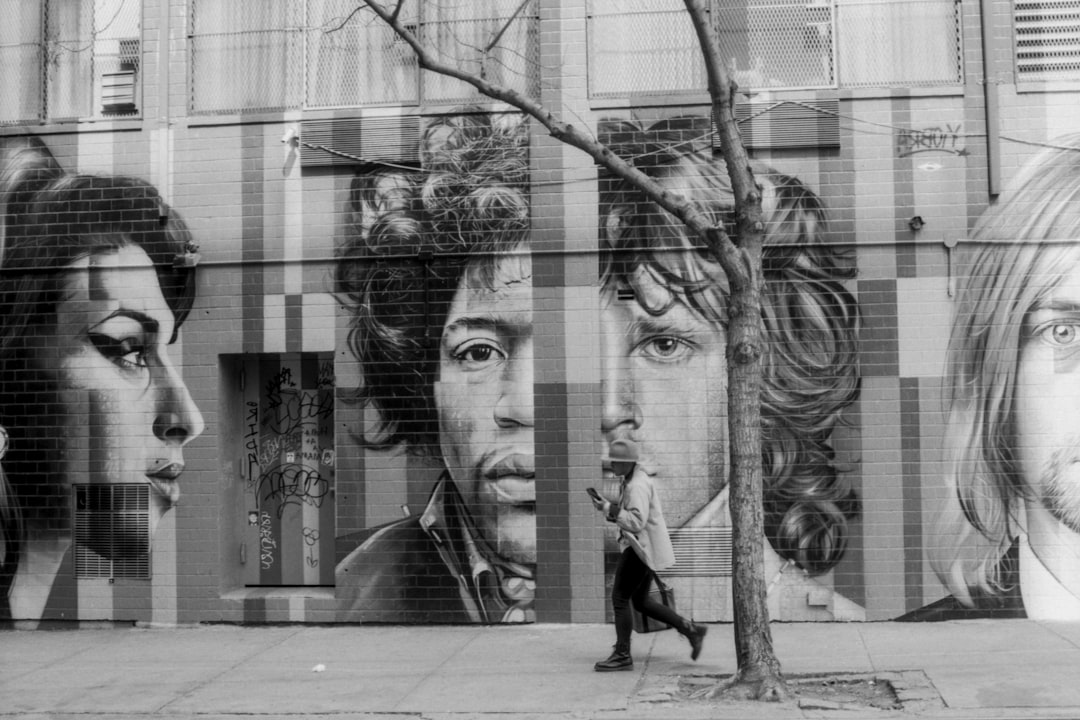 grayscale photography of murals