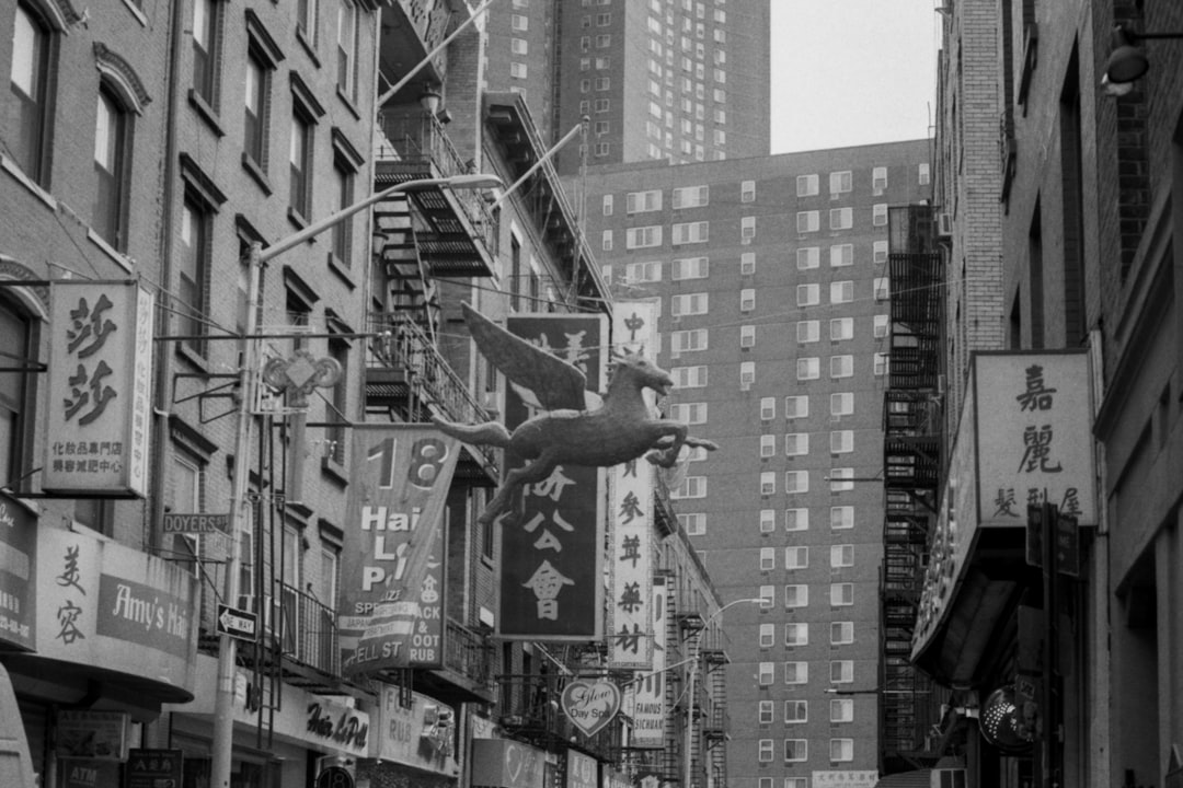 grayscale photo of store signage