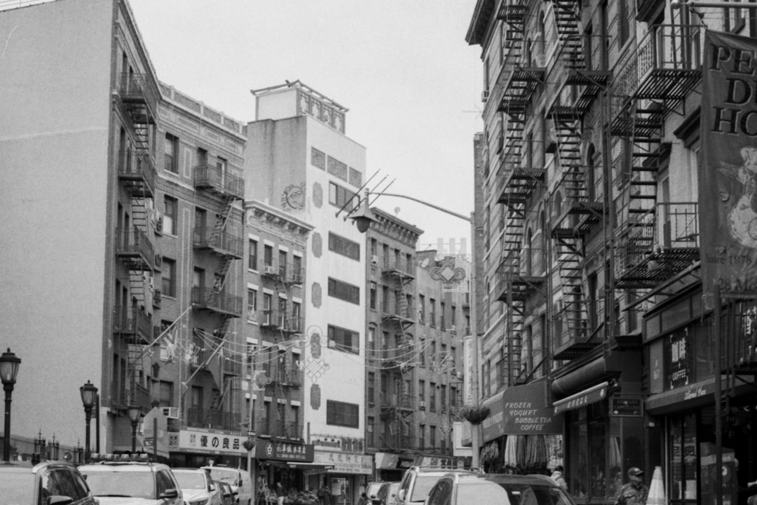 grayscale photo of inline cars