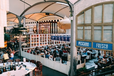 A vibrant interior of the Friesesco restaurant, full of happy customers enjoying their meals.