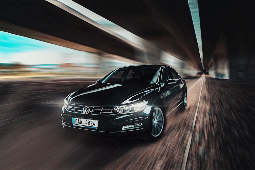 black Volkswagen sedan on the street