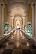 people walking on hallway inside building