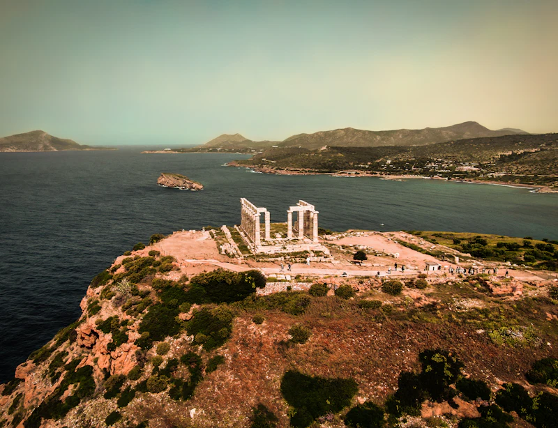 Aerial view of the Temple of Poseidon on the headland at Sounion