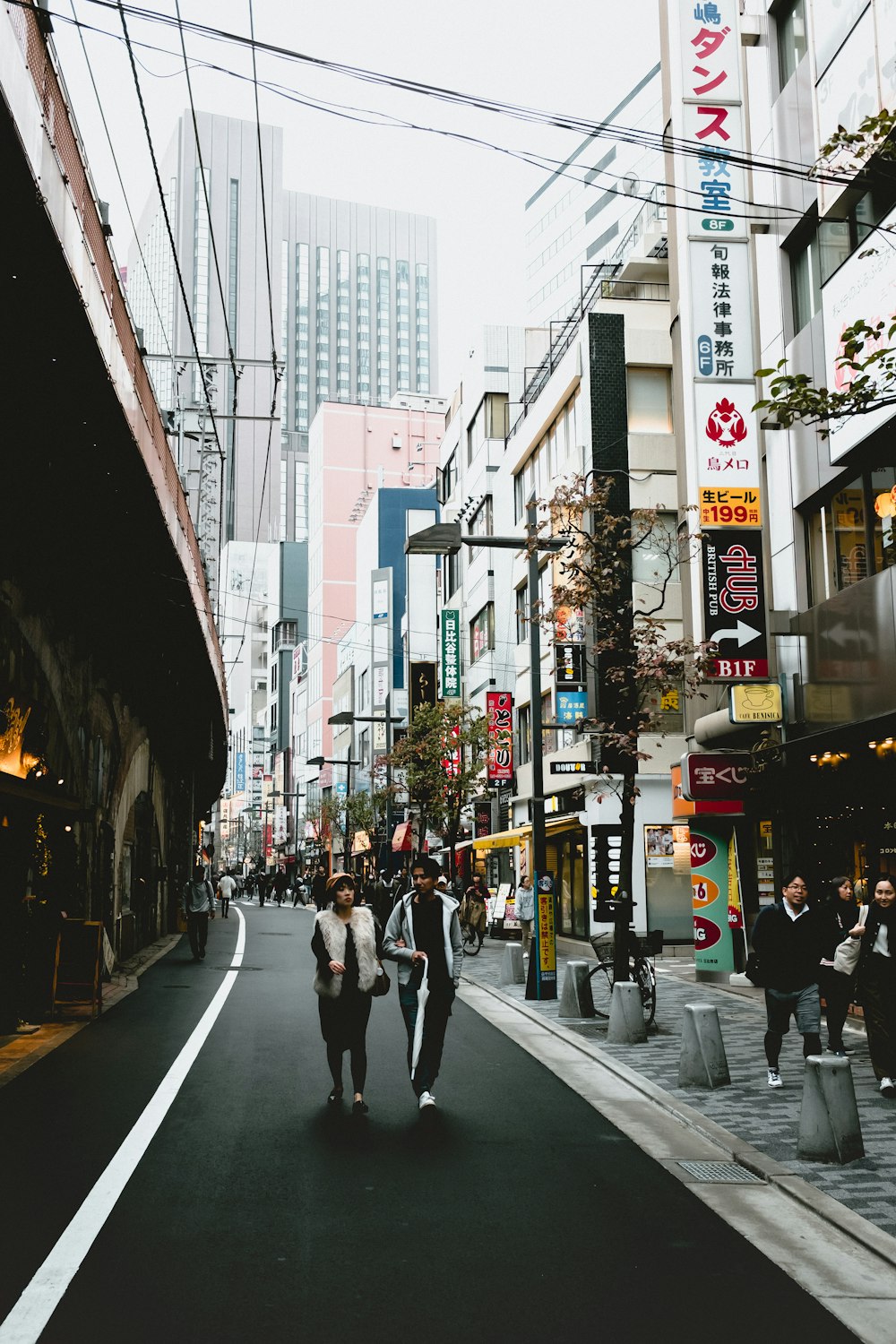 unknown persons walking outdoors