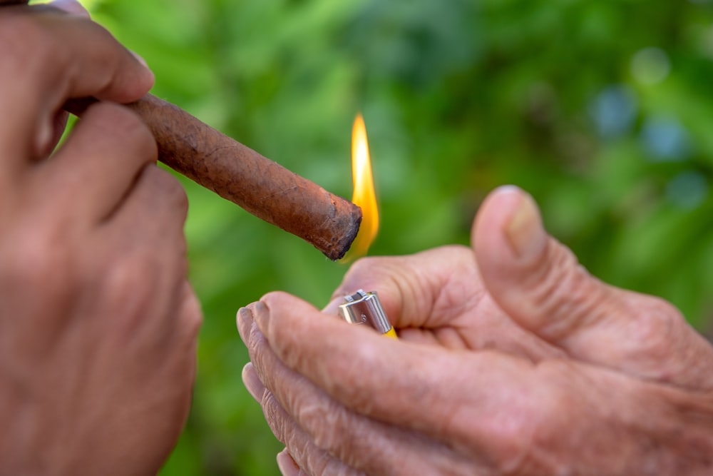 person about to light tobacco