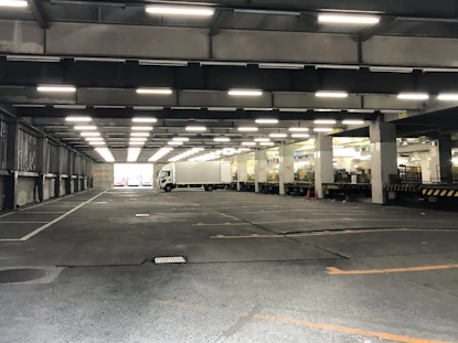 Industrial flooring and loading docks inside a newly finished warehouse.
