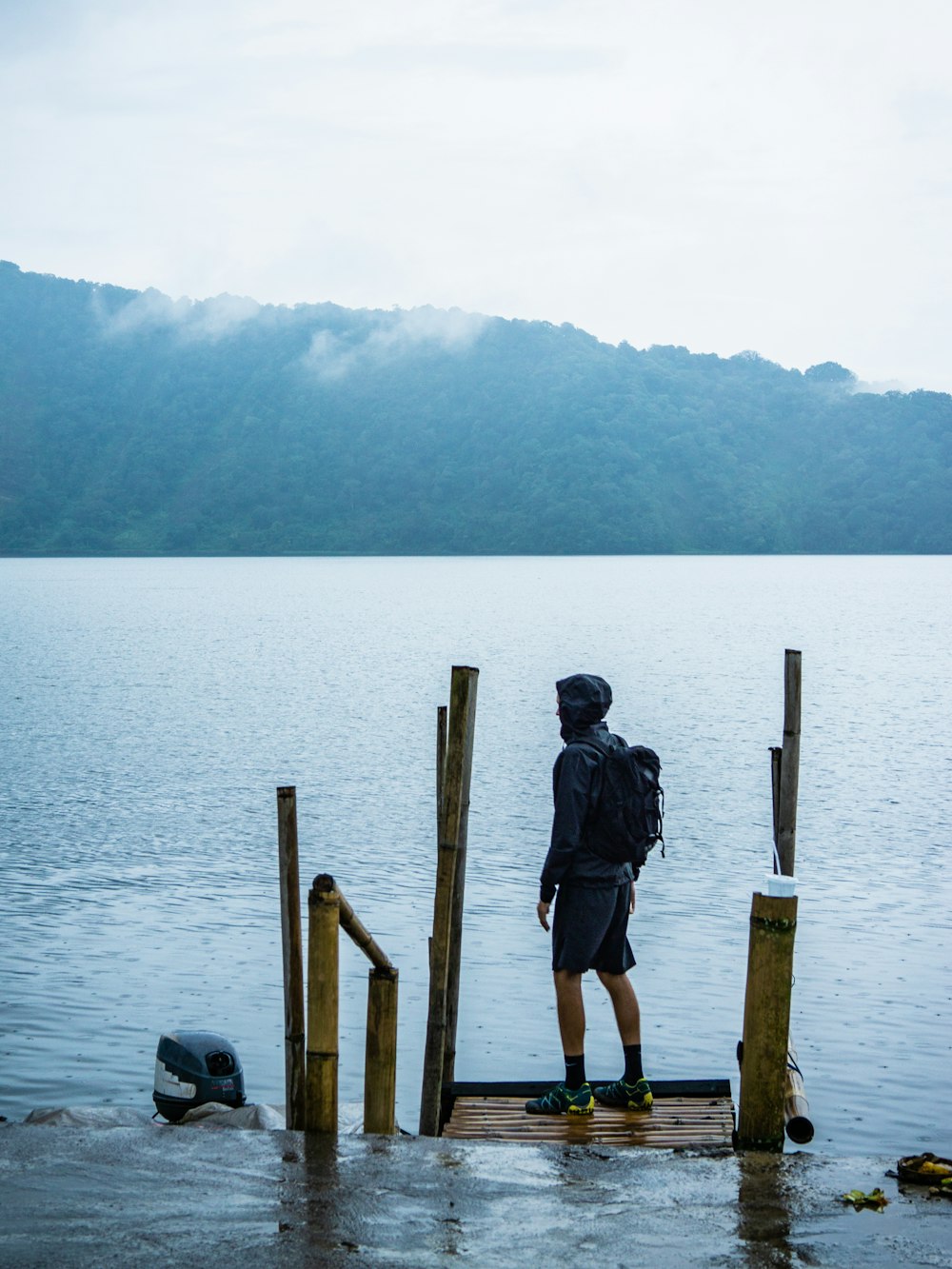 man standing on dock