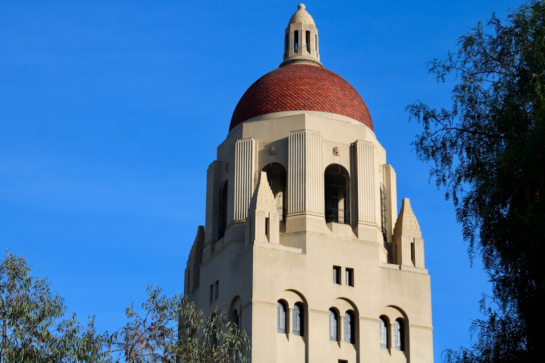 architectural photo of a beige and brown building, Stanford University. Palo Alto California United States.</p></figure><p>Leland Stanford Junior University (Stanford University) is a private research university in Stanford, California. Stanford is known for its academic strength, wealth, selectivity, proximity to Silicon Valley, and ranking as one of the world