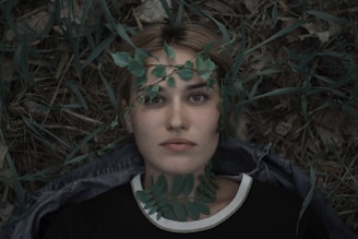 shallow focus photo of woman in black crew-neck shirt