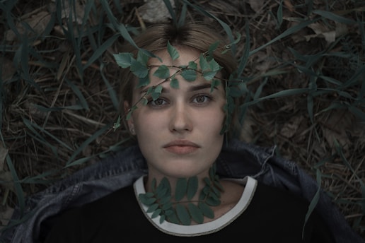 shallow focus photo of woman in black crew-neck shirt