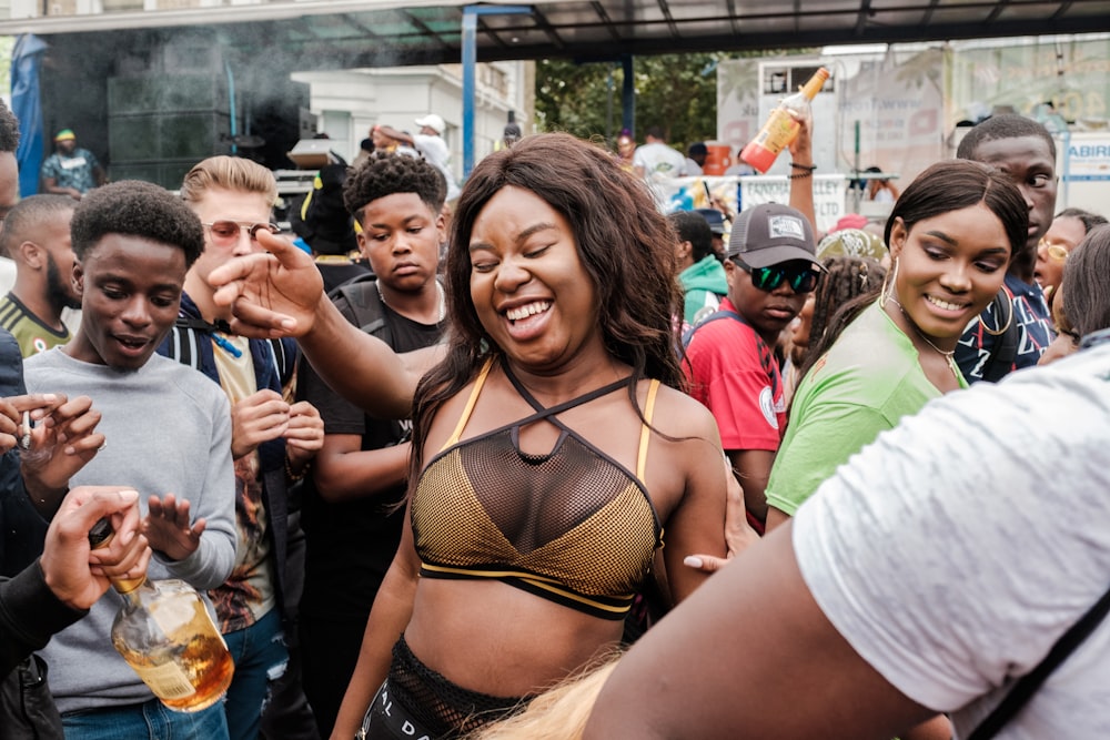 woman in brown bra near people