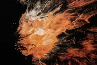 An abstract swirl of vibrant colors colliding in a controlled yet chaotic explosion.