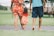 A family enjoying a sunny day at the park, all wearing colorful sandals.