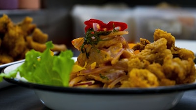 Close-up of a colorful, healthy air fryer meal plated beautifully.