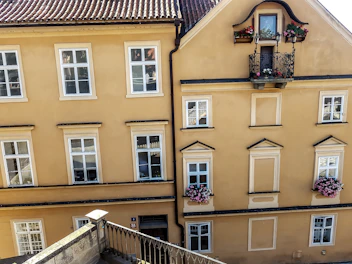 Exterior view of the hostel building with a charming facade.