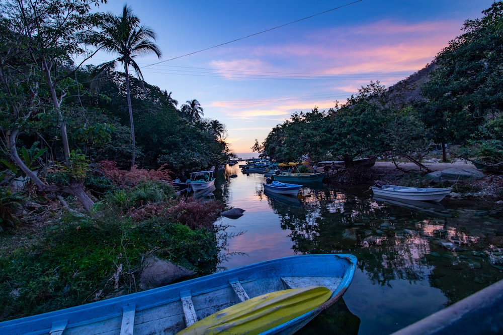 blue gondola on body of water