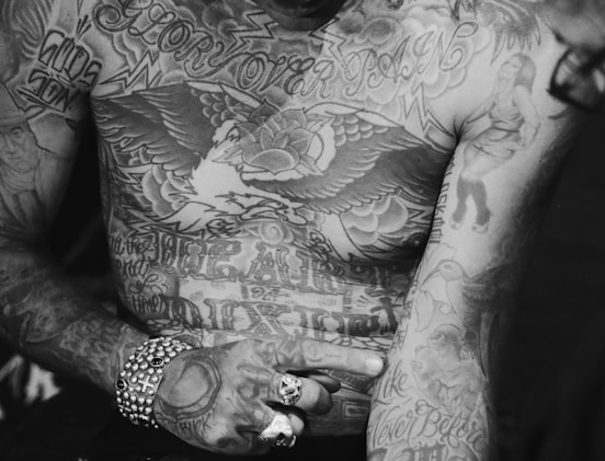 man with assorted body tattoo
