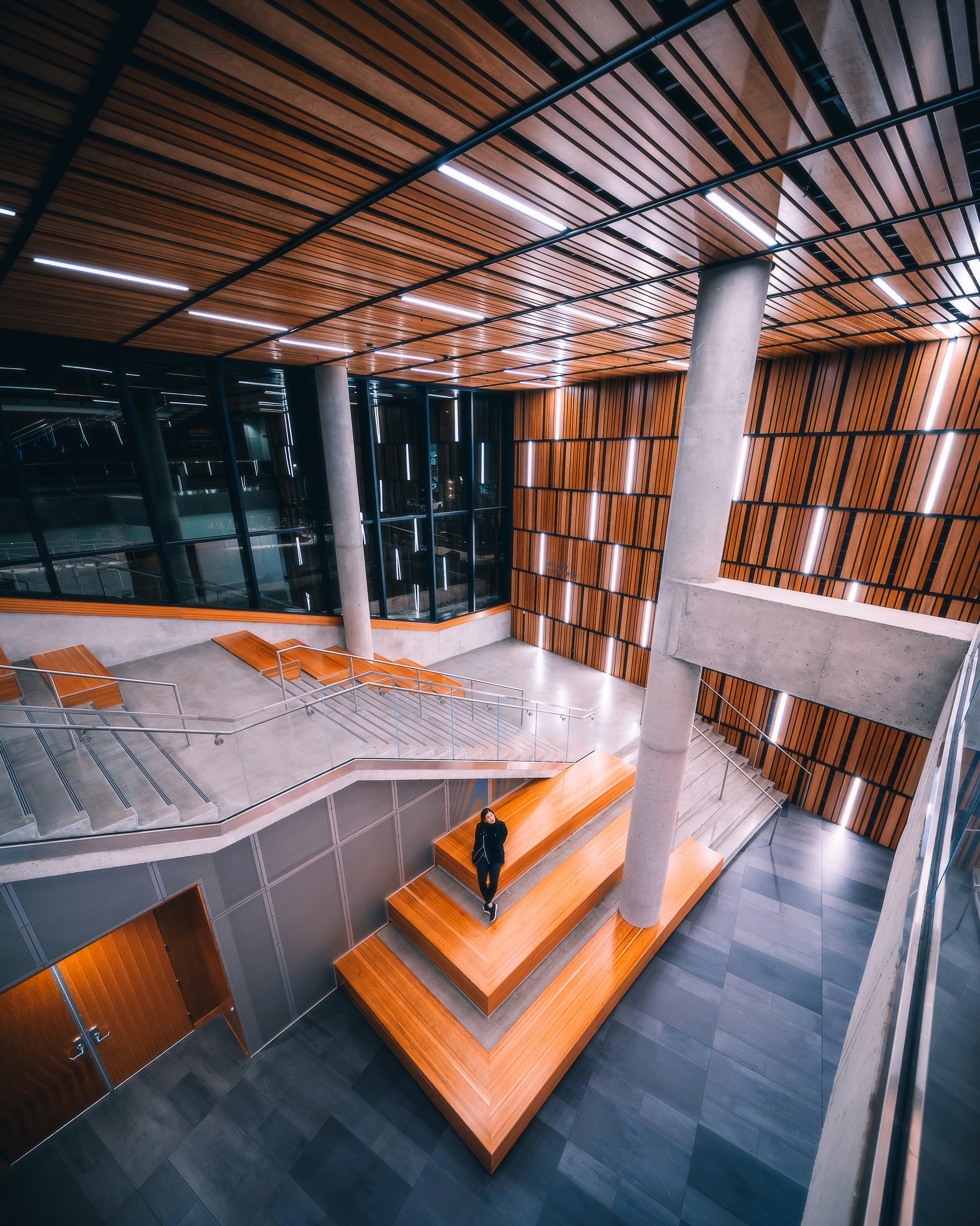 woman standing on brown stair