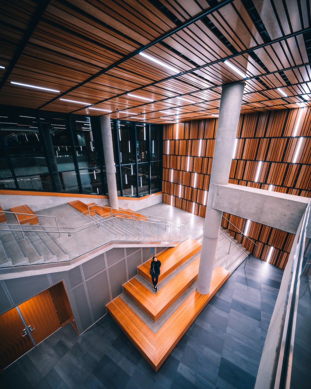 woman standing on brown stair