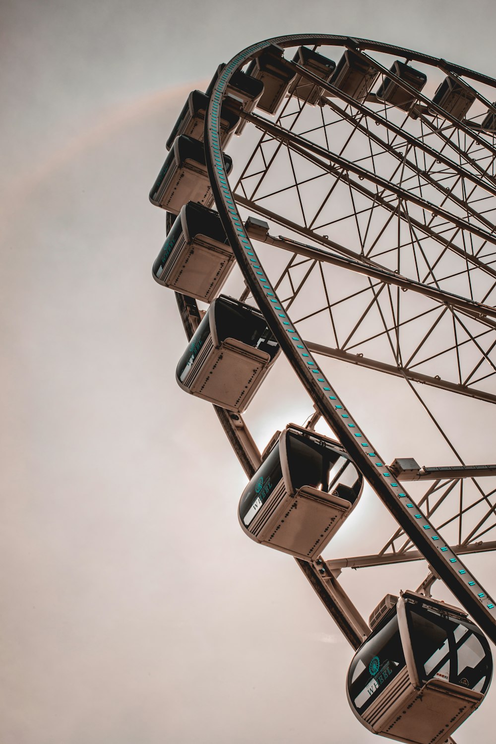 low-angle photography of brown ferris wheel