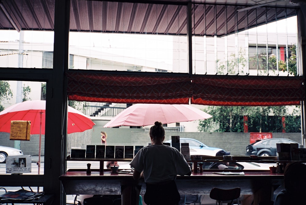 woman sitting inside cafe