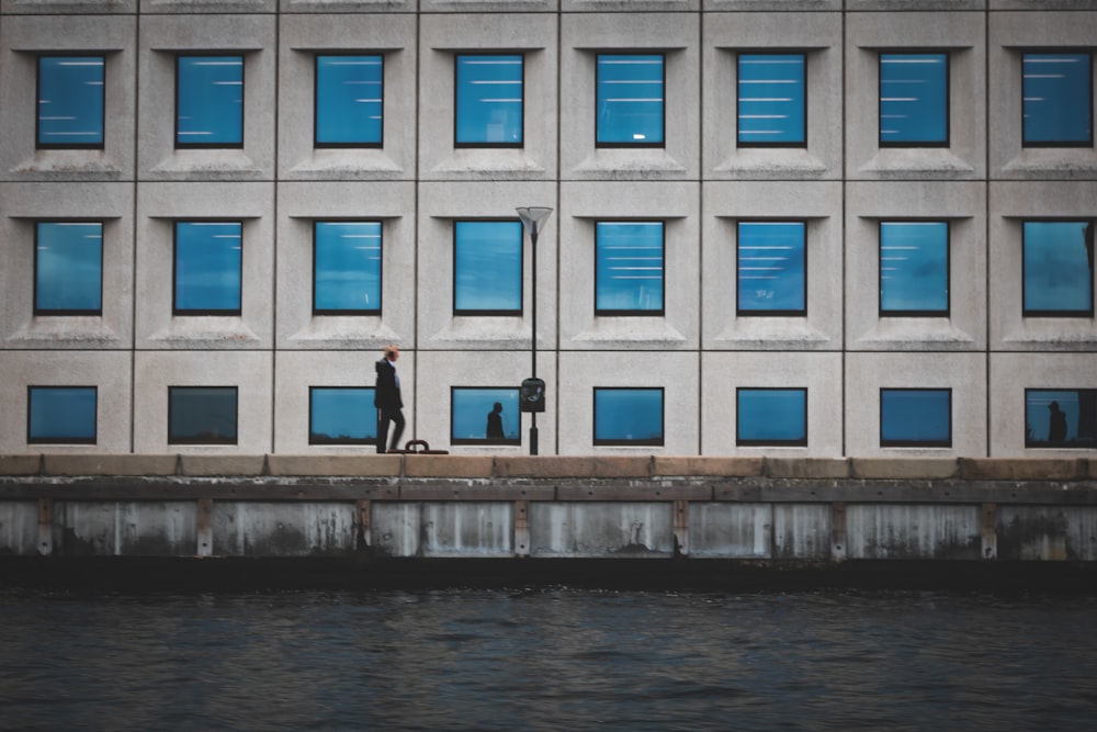 architectural photography of gray and blue building