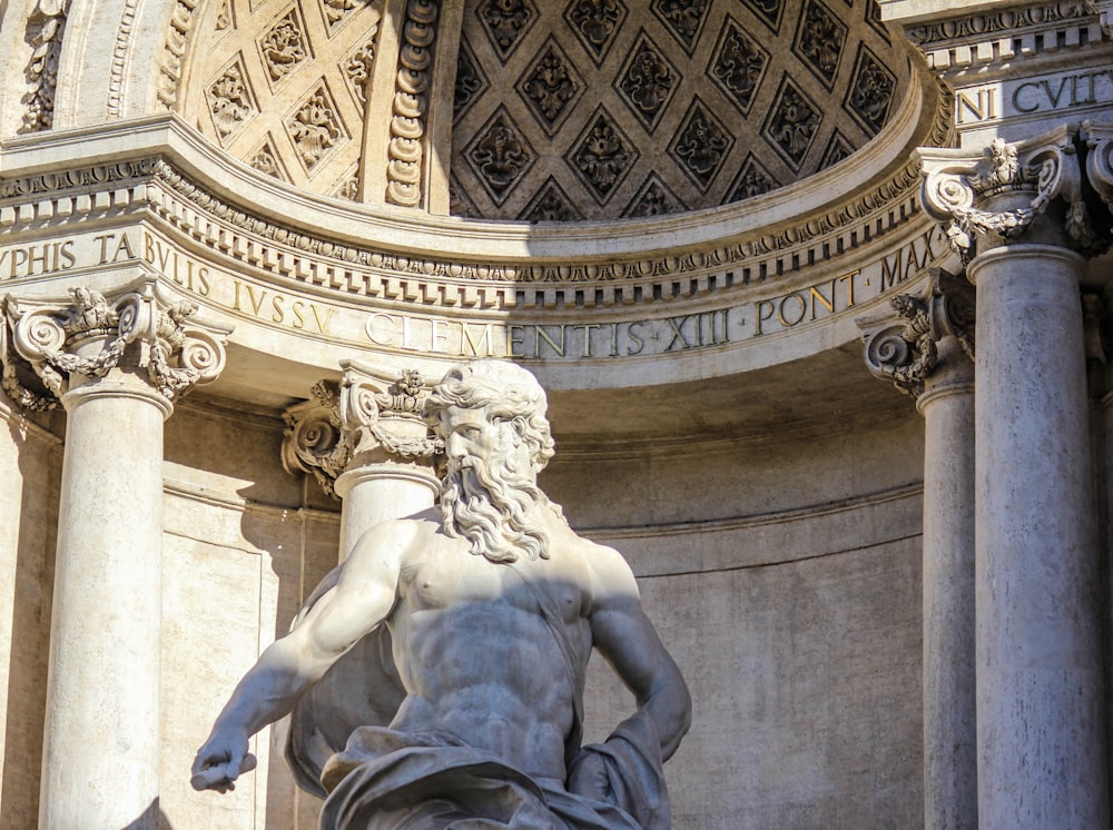 gray concrete Poseidon statue