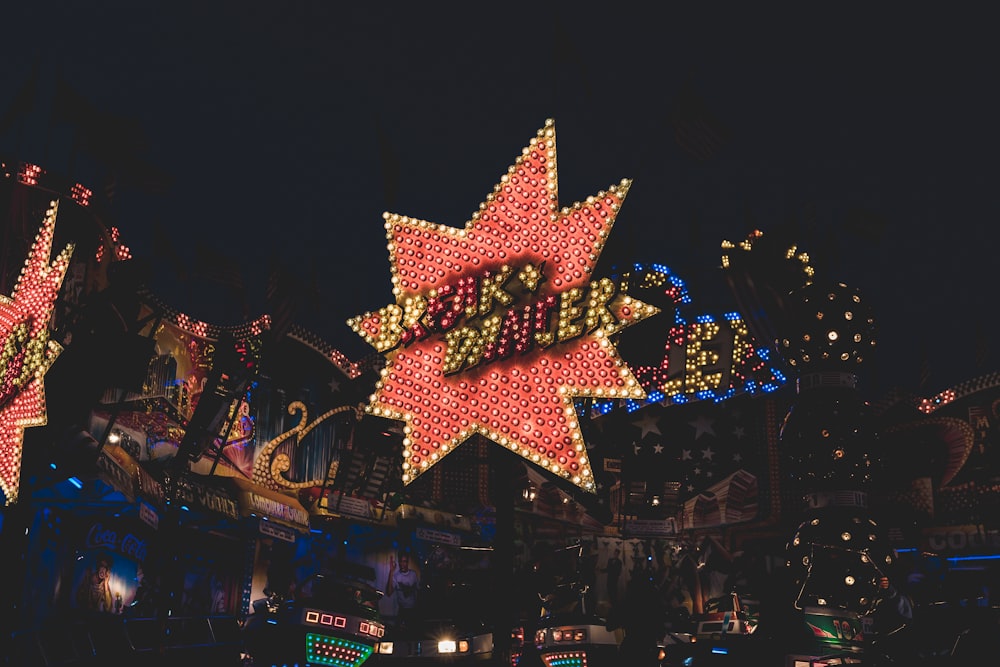 red and yellow star signage at night