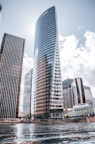 high-rise buildings near body of water during day
