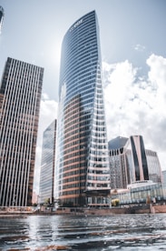 high-rise buildings near body of water during day
