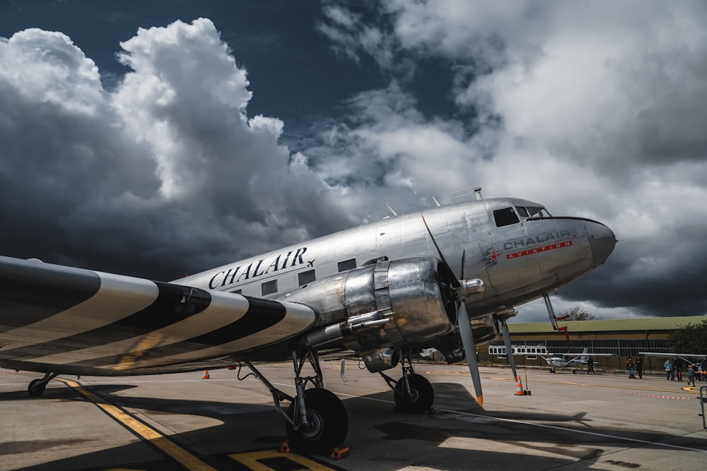 silver Chalair airplane in airport