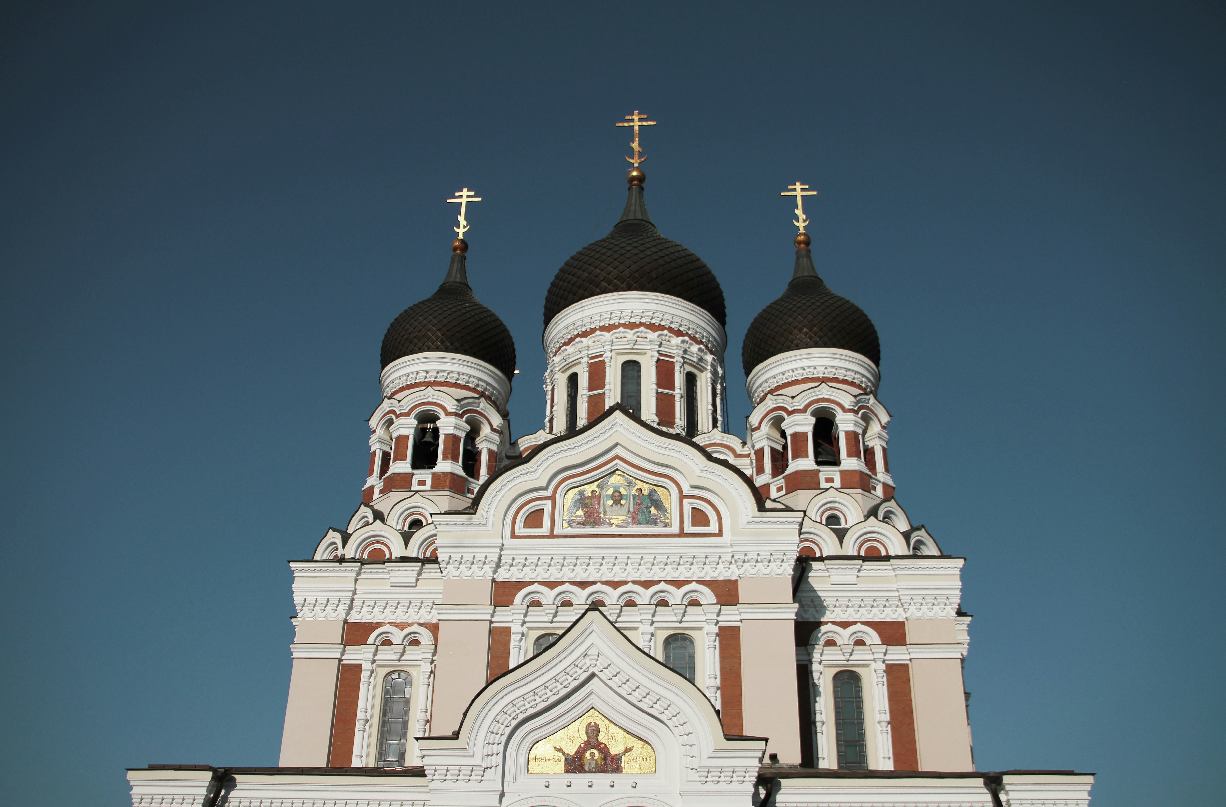 white and brown concrete church